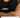 ALPHA GYM GRIT Stringer Black/White – Detail: Weißes Frontlogo